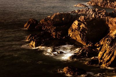 Scenic view of rocks in sea