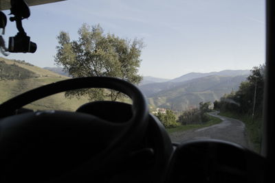 Close-up of a car on road