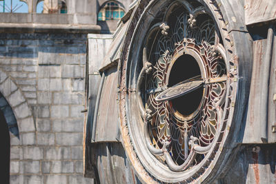 Close-up of vintage car against building