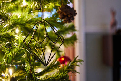 Close-up of geometric, modern, christmas tree decoration