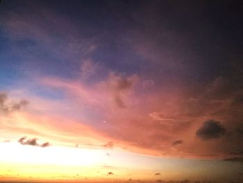 Low angle view of dramatic sky during sunset