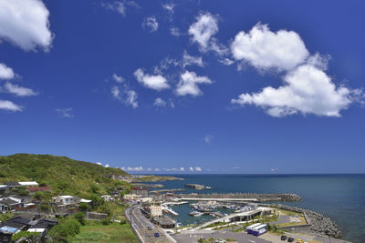 High angle view of town by sea