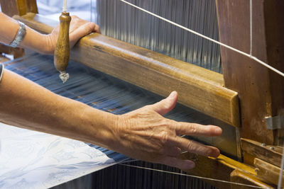 Close-up of woman working in factory