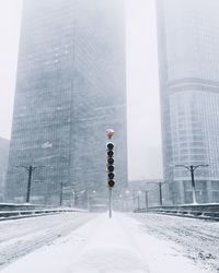 Street towards skyscrapers in winter