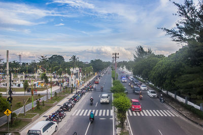 High angle view of vehicles on road in city