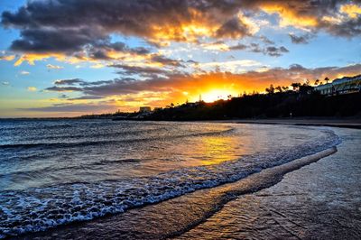 Scenic view of sea against sky at sunset