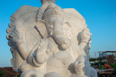 Close-up of statue against sky