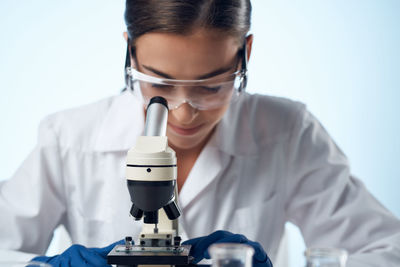 Scientist experimenting in laboratory