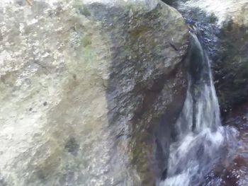 Close-up of waterfall in sea