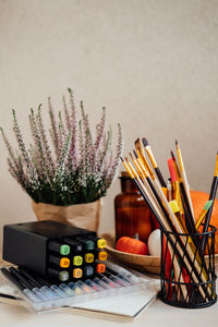 Close-up of multi colored pencils on table