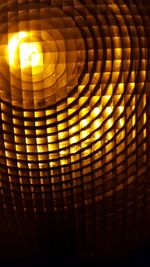 Low angle view of illuminated lamp