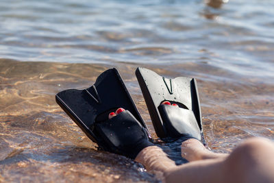 Low section of woman in water