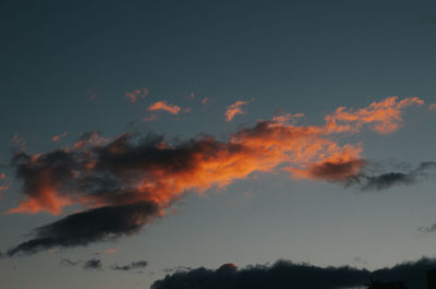 Low angle view of dramatic sky at sunset