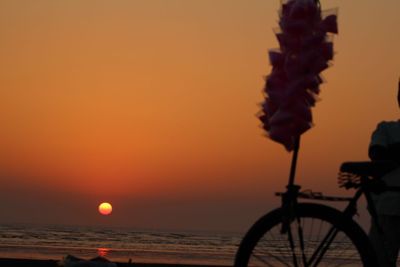 Scenic view of sea against sky at sunset