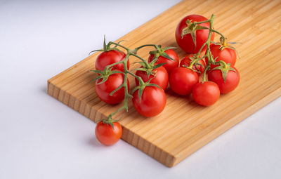 High angle view of cherry tomatoes on table