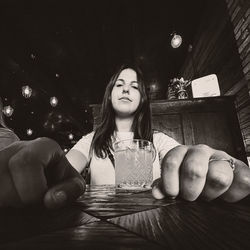 Portrait of woman sitting in restaurant