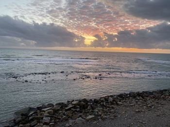 Scenic view of sea during sunset