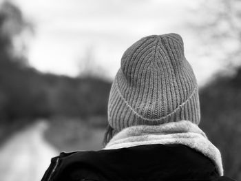 Rear view of woman wearing hat