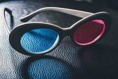 Close-up of sunglasses on table