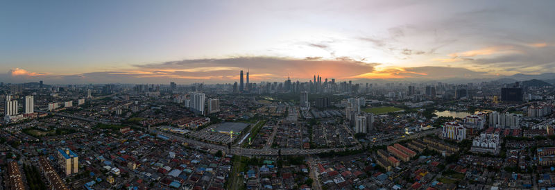 High angle view of cityscape against sky during sunset