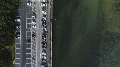 High angle view of buildings by sea