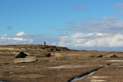 Scenic view of land against sky