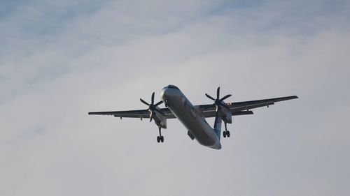 Propeller plane on landing approach to vienna airport