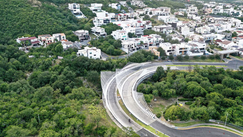 High angle view of road amidst buildings in city