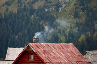 Rustic house against mountain