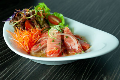 High angle view of salad in bowl on table