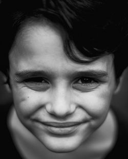 Close-up portrait of smiling boy