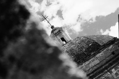 Low angle view of tower against the sky