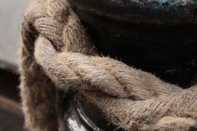Close-up of rope tied to fishing net