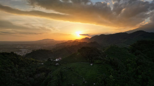 Scenic view of mountains against sky during sunset