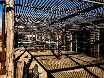 Shadow of metal structure against sky