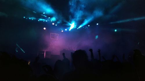 Silhouette crowd at music concert