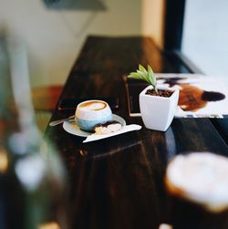 Close-up of coffee cup on table