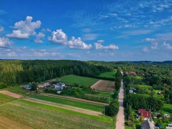 High angle view of trees on field against sky