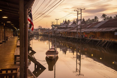 Boats moored at harbor