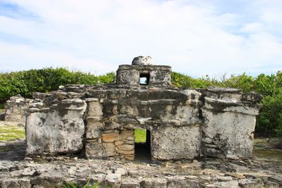 Old ruins of building against sky