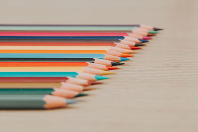 Close-up of colored pencils on table