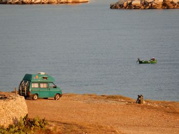 People in boat on sea