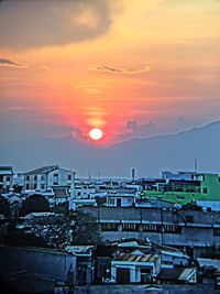 Scenic view of dramatic sky during sunset