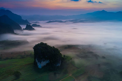 Scenic view of mountains against sky during sunset