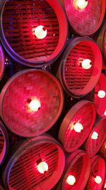 Full frame shot of lit candles in temple