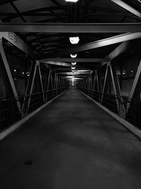 Illuminated bridge at night