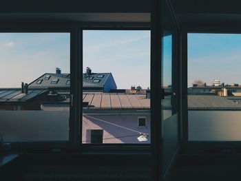 Illuminated cityscape against sky