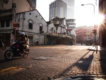 Street in city against sky