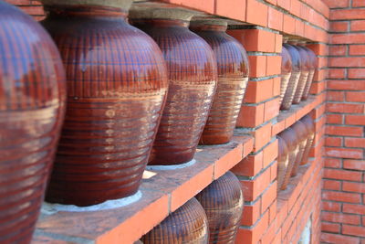 Close-up of pots on shelf for sale