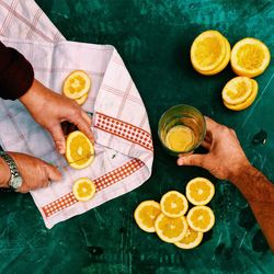 Cropped image of hand holding drink